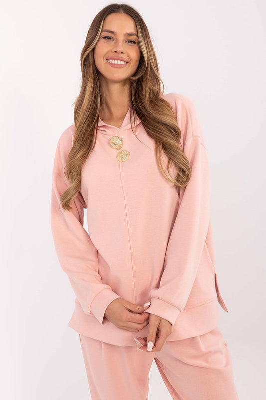 Luxurious Italy Moda Women's Sweatshirt Blouse in soft polyester blend with unique side slits and stylish detachable brooches, perfect for versatile fashion.