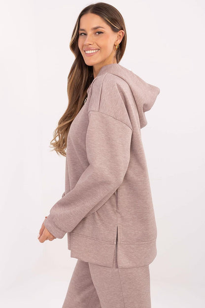 Detail view of Italy Moda's luxurious polyester blend in the women's sweatshirt blouse, emphasizing its soft texture and fashionable design.