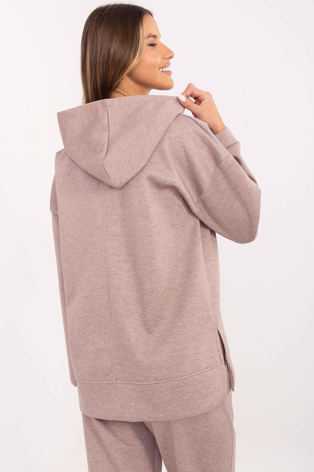 Elegant Italy Moda sweatshirt blouse displayed on a hanger, showcasing the harmonious blend of fabrics and the stylish brooches, a must-have for fashion-forward women.