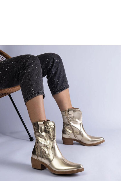 Solea Golden Cowboy Ankle Boots in Metallic Vegan Leather, showcasing elegance and style with a shiny finish, perfect for luxe outfits.