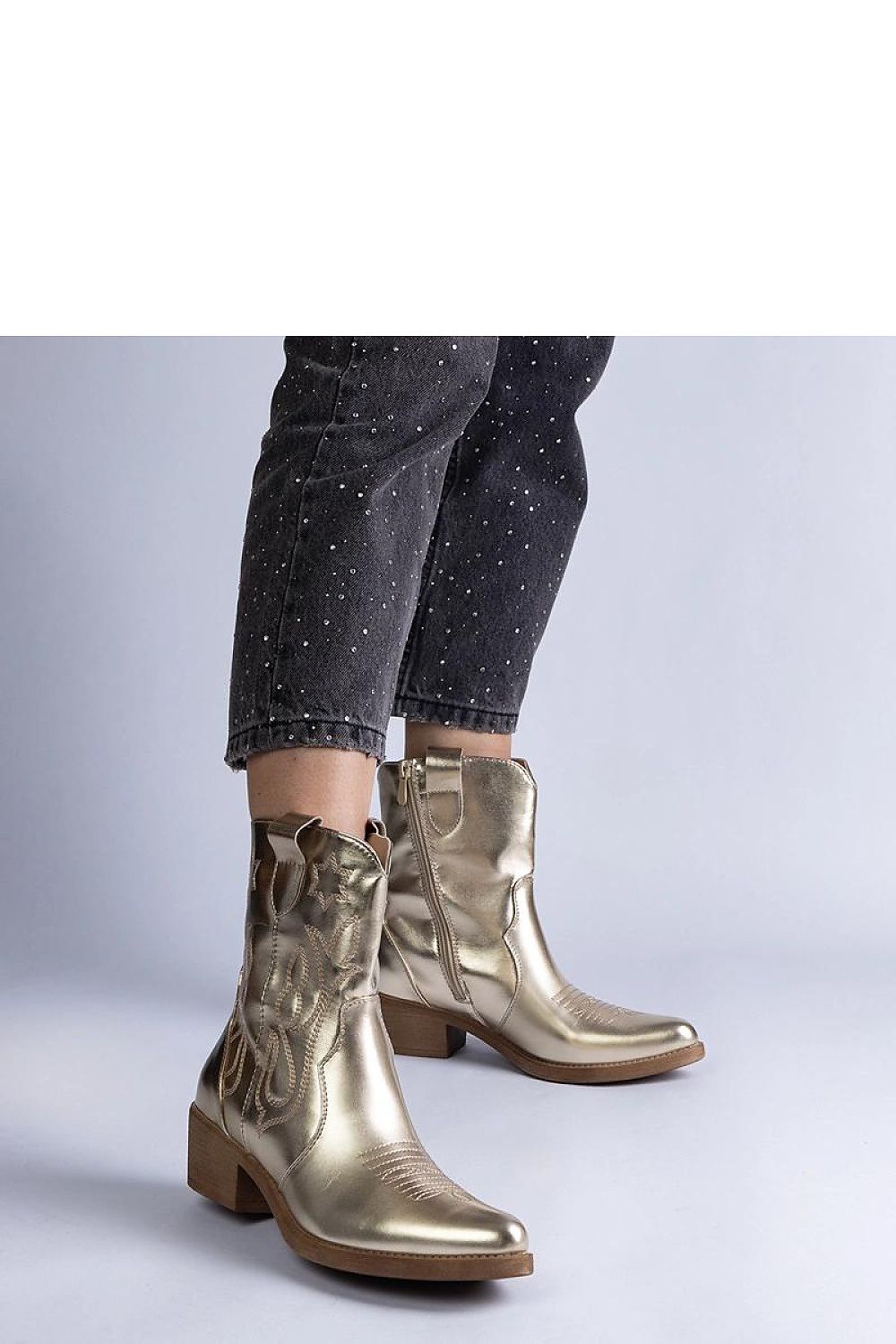 Stylish Solea Metallic Vegan Leather Cowboy Ankle Boots, featuring a comfortable post heel, ideal for fashionable winter wear.