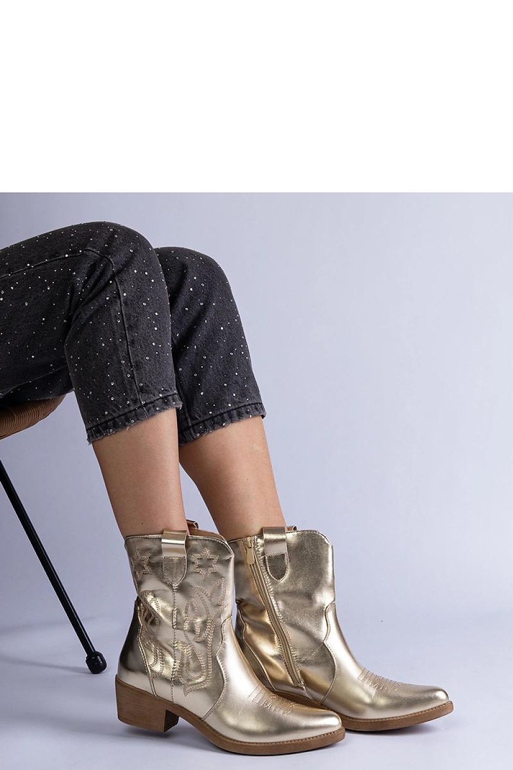 Close-up of Solea Golden Cowboy Ankle Boots, highlighting the high-quality construction and luxurious metallic finish, ideal for fashion-forward women.