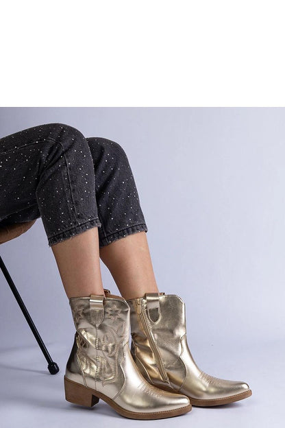 Close-up of Solea Golden Cowboy Ankle Boots, highlighting the high-quality construction and luxurious metallic finish, ideal for fashion-forward women.