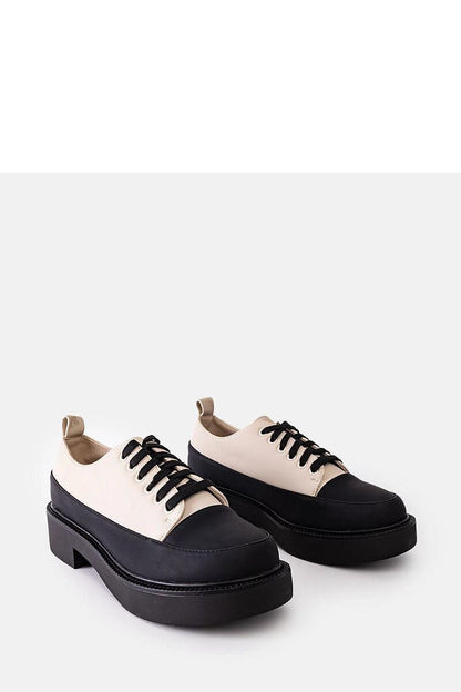 Solea elegant black flat-heeled summer shoes crafted from eco leather, showcasing a sleek design perfect for warm weather attire.