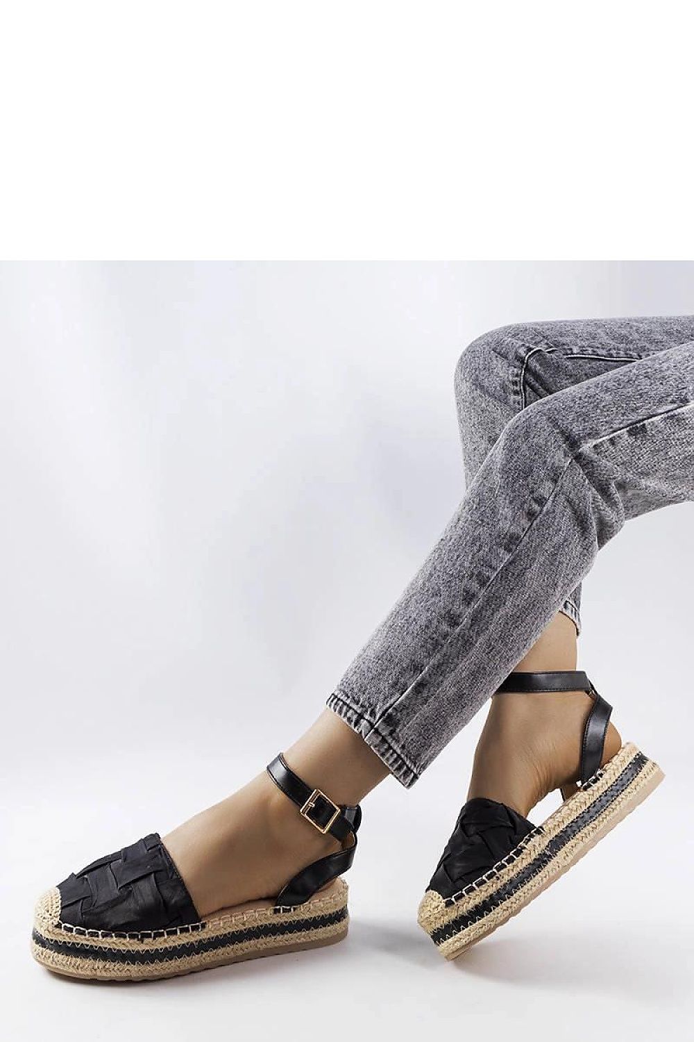 Close-up view of Solea Black Platform Espadrilles, featuring a durable rubber sole and practical buckle fastening, epitomising luxury and eco-friendly fashion.