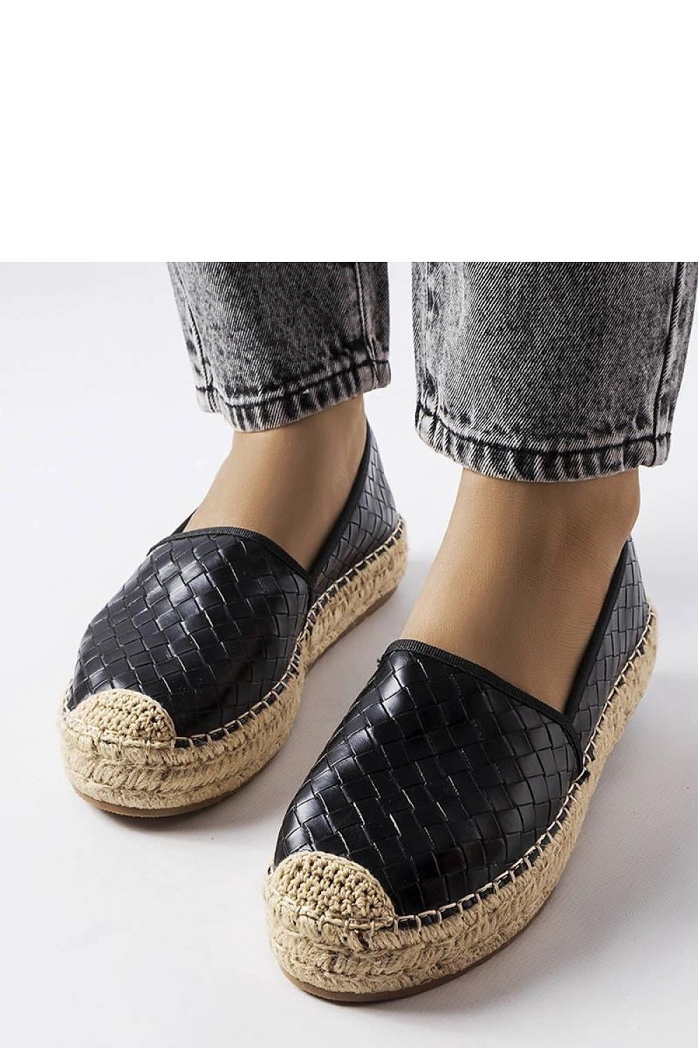 Trendy black eco-leather espadrilles by Solea, designed for effortless style and comfort, perfect for pairing with skirts or jeans in the summer.