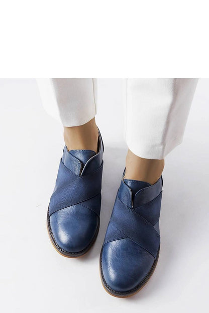 Solea Winnipeg navy loafers displayed elegantly, ideal for summer wear, crafted from eco-friendly leather with a stylish brown synthetic sole.