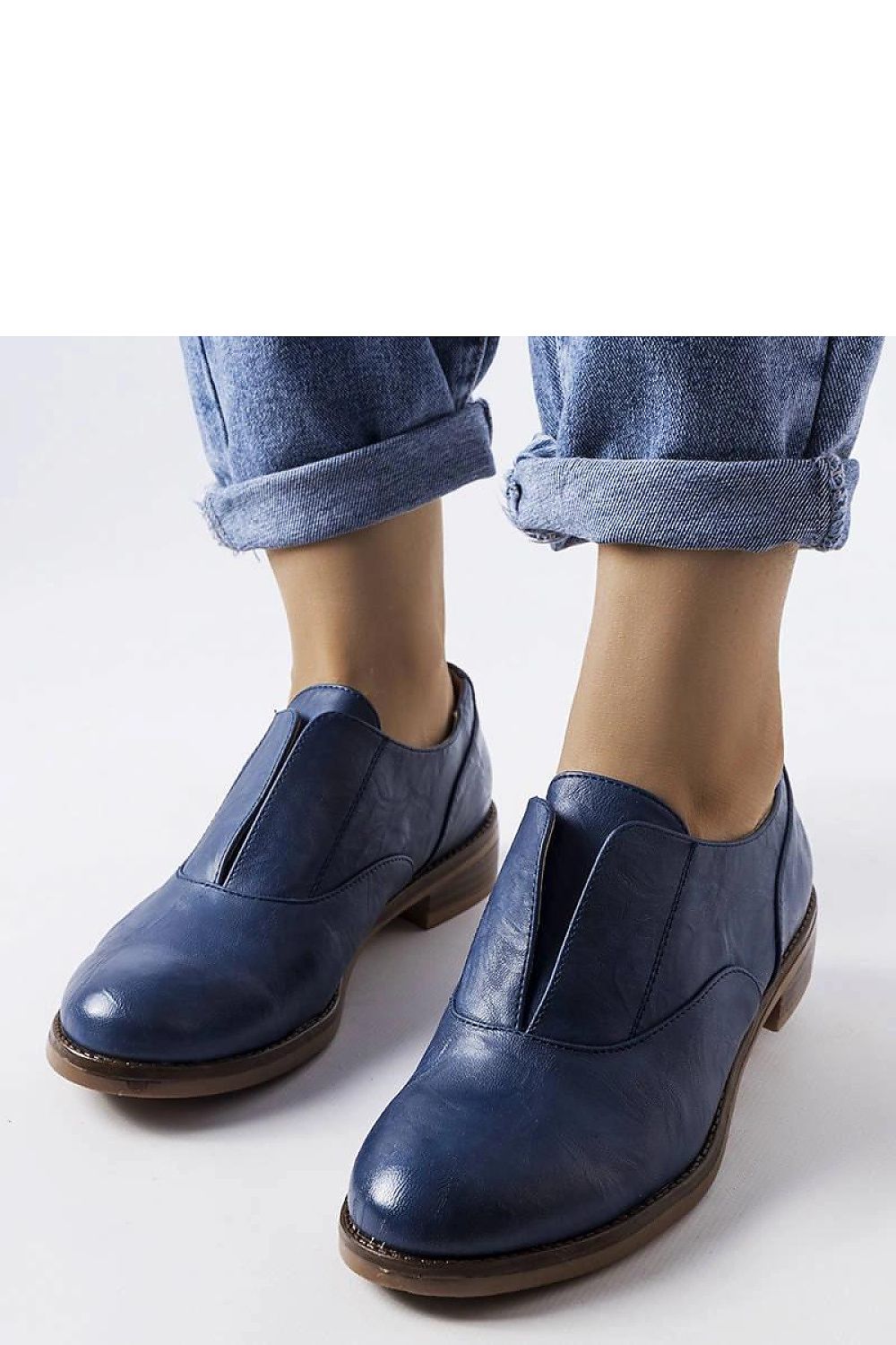 Close-up of Solea red Burdett vegan leather loafers, highlighting the eco-friendly material and modern round toe.