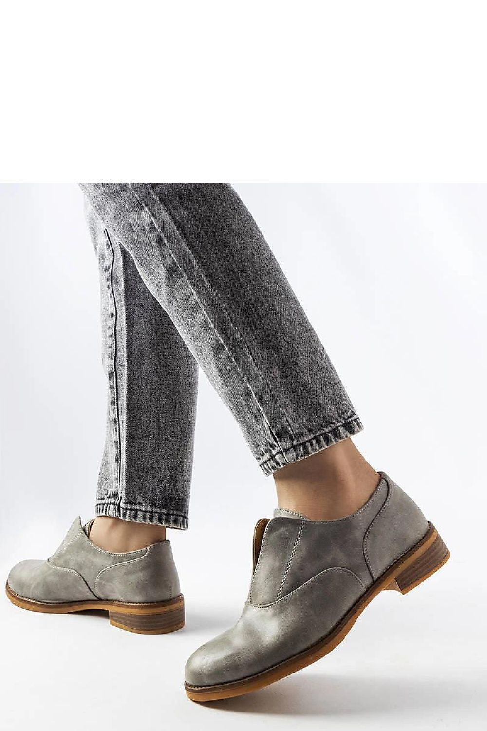 Solea red Burdett loafers displayed with summer outfits, representing luxury and comfort for fashionable women.