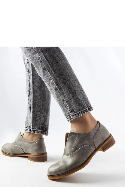 Solea red Burdett loafers displayed with summer outfits, representing luxury and comfort for fashionable women.