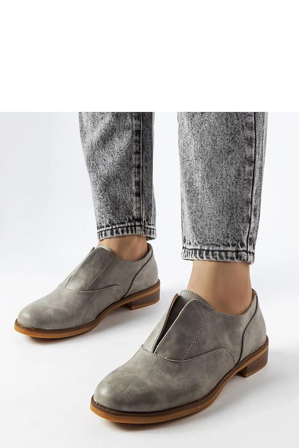 Solea vegan leather loafers in red, featuring a chic low heel and slip-on style, ideal for all-day wear.