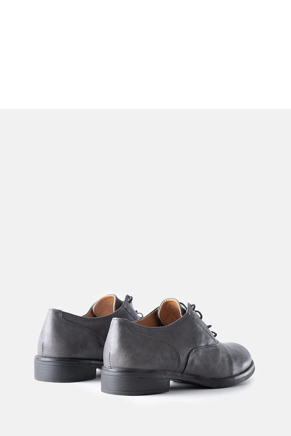 Solea Red Burdett vegan leather loafers styled with summer outfits, reflecting their versatility and chic appeal for fashionable women.