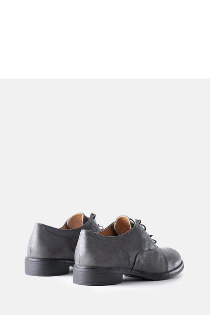 Solea Red Burdett vegan leather loafers styled with summer outfits, reflecting their versatility and chic appeal for fashionable women.