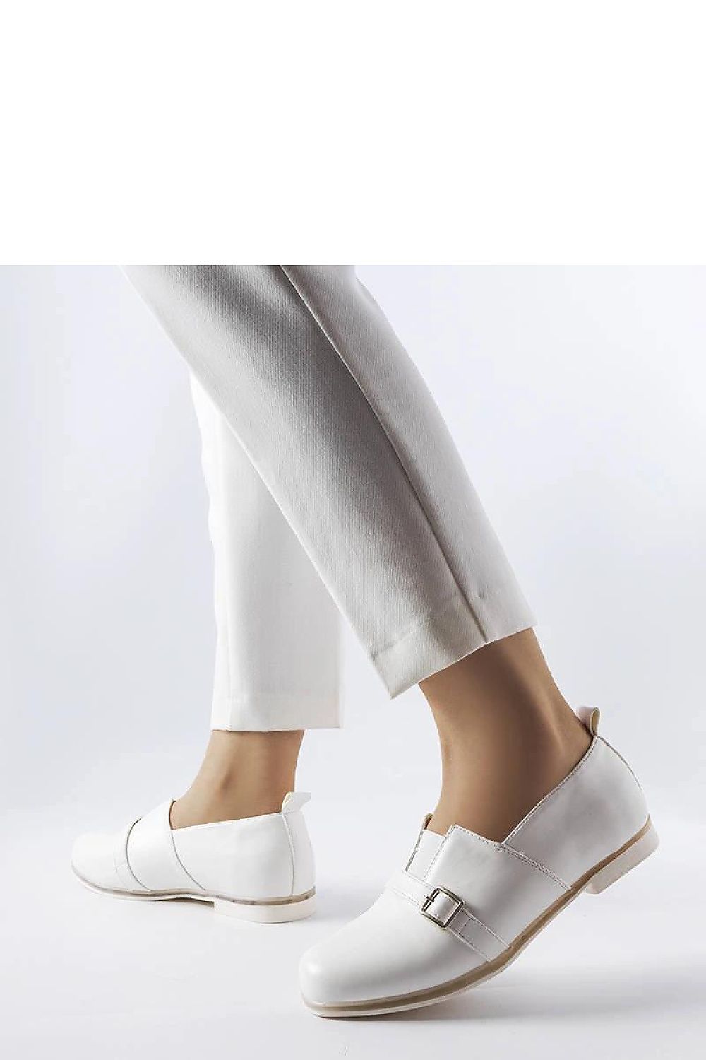 Close-up view of Solea white Felosa loafers, highlighting the soft leather insole and stylish round toe for ultimate comfort.