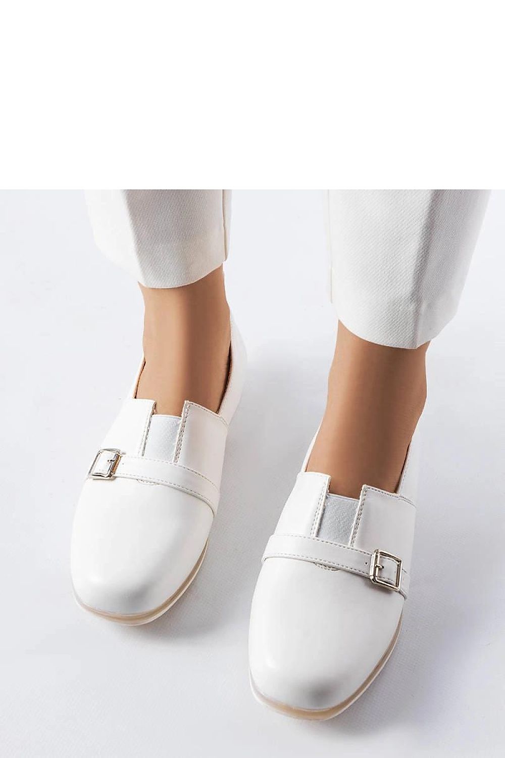 Stylish Solea white Felosa loafers displayed against a refined background, ideal for modern women seeking fashionable summer footwear.