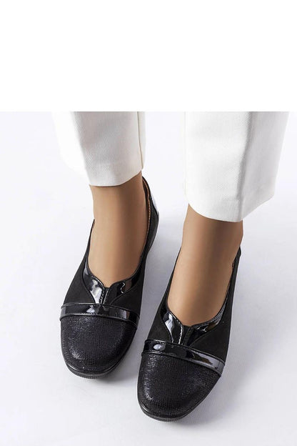 Sophisticated Solea Black Wedge Half Shoes, featuring a stylish silhouette and designed for ultimate comfort on warmer days.