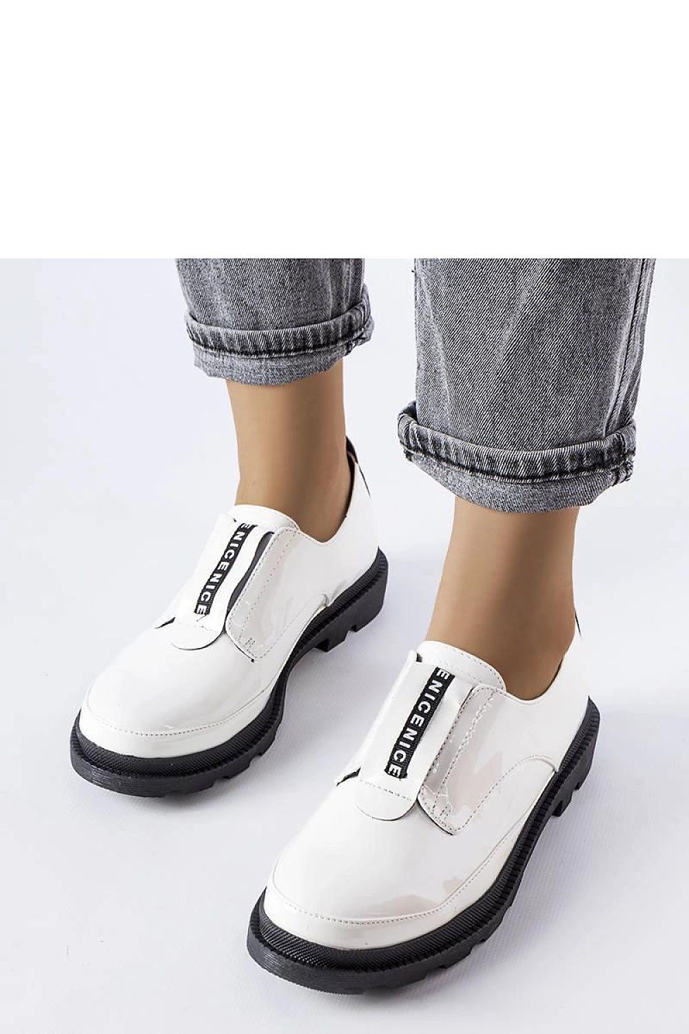 Elegant Solea white patent leather Legget loafers with a trendy tractor sole, showcasing stylish round toe design and minimalist stitching, perfect for spring-summer fashion.