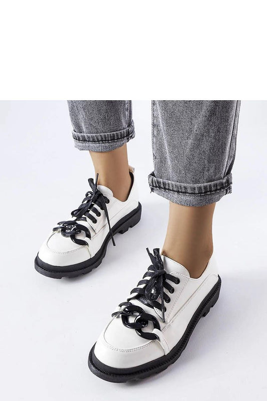 Solea White Eco-Leather Loafers showcasing a chic chain detail, designed for comfort and style with a trendy tractor sole, ideal for summer wear.