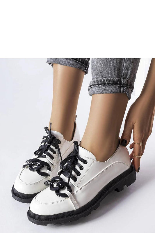 Side view of Solea White Eco-Leather Loafers, featuring a modern square heel and minimalist stitching, perfect for elevating any summer outfit.