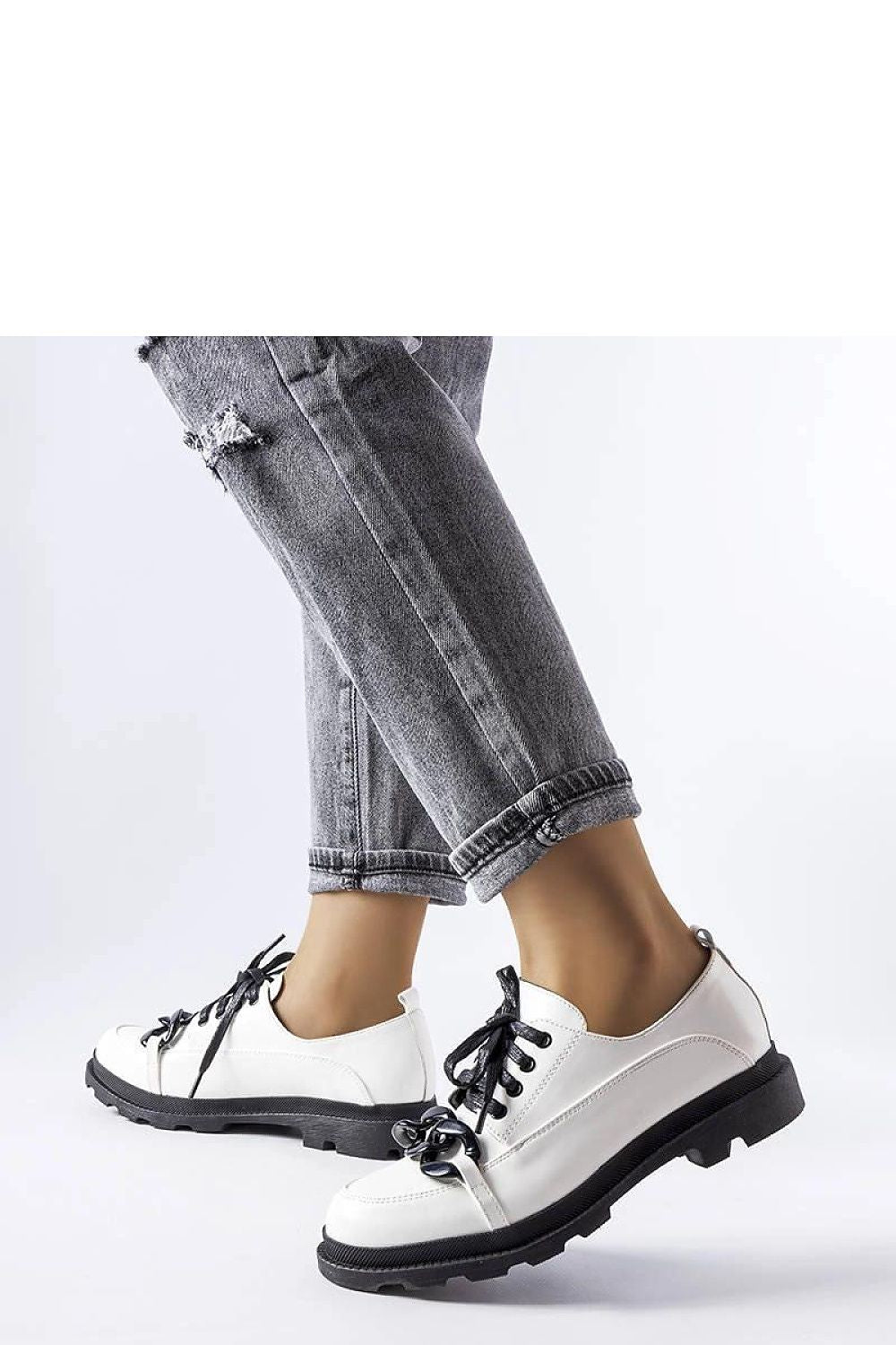 Luxurious Solea white eco-leather loafers featuring chain detail, designed with a trendy tractor sole, perfect for summer elegance and comfort.