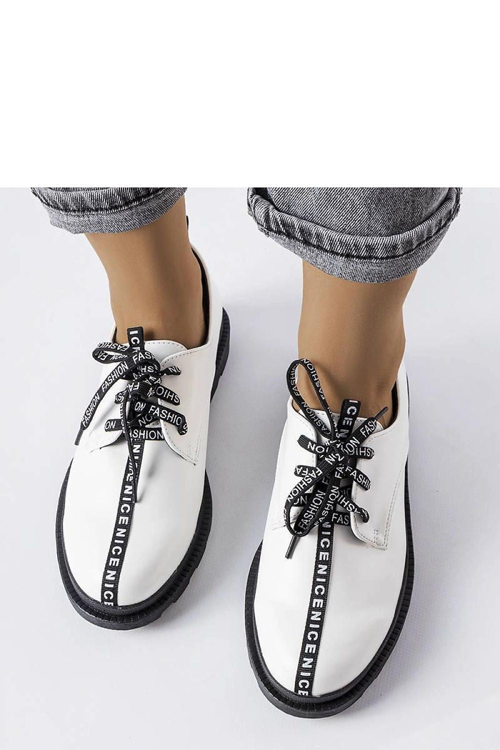 Front view of the Solea White Hanifan loafers with a laced closure, exemplifying comfort and style for warm-weather outfits.