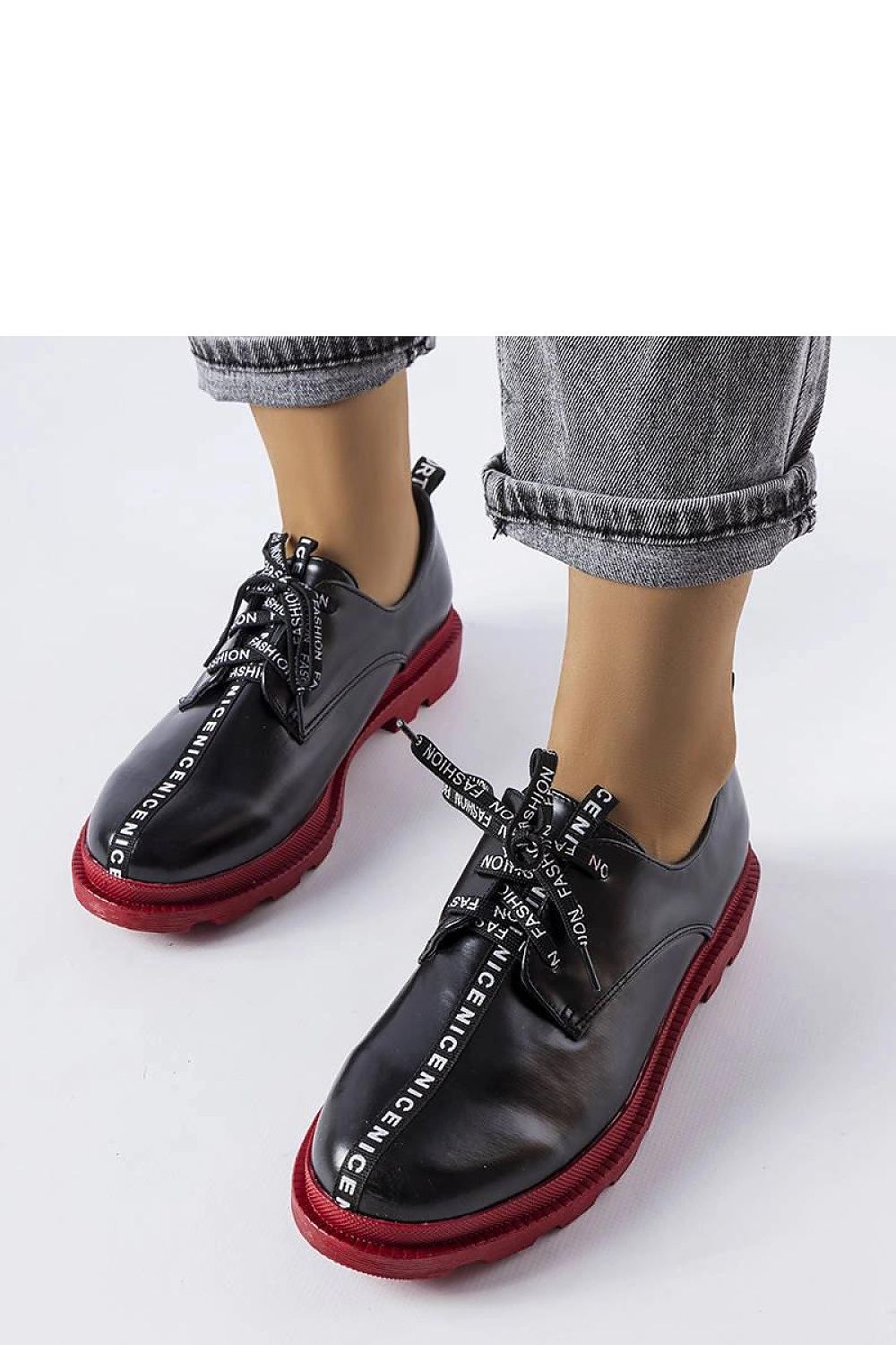 Lifestyle image of women wearing Solea White Hanifan loafers paired with chic summer attire, highlighting their versatility and luxury appeal.