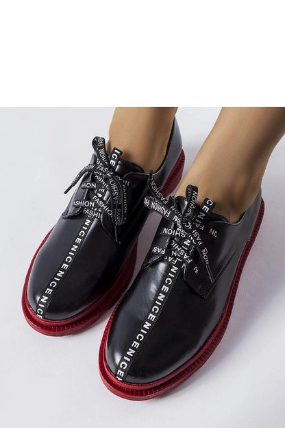 Solea white Hanifan loafers featuring a contrasting tractor sole and a stylish minimalist design, perfect for elegant summer outfits.