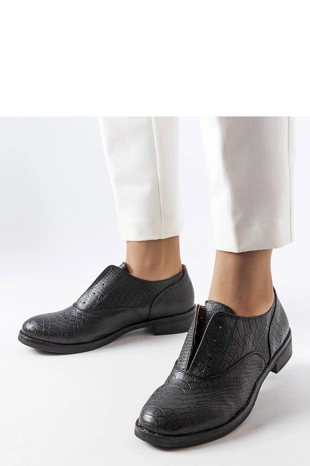Solea Elegant Eco-Leather Slip-On Morel Half Shoes for Women in Black, showcasing a stylish low upper and round toe design.