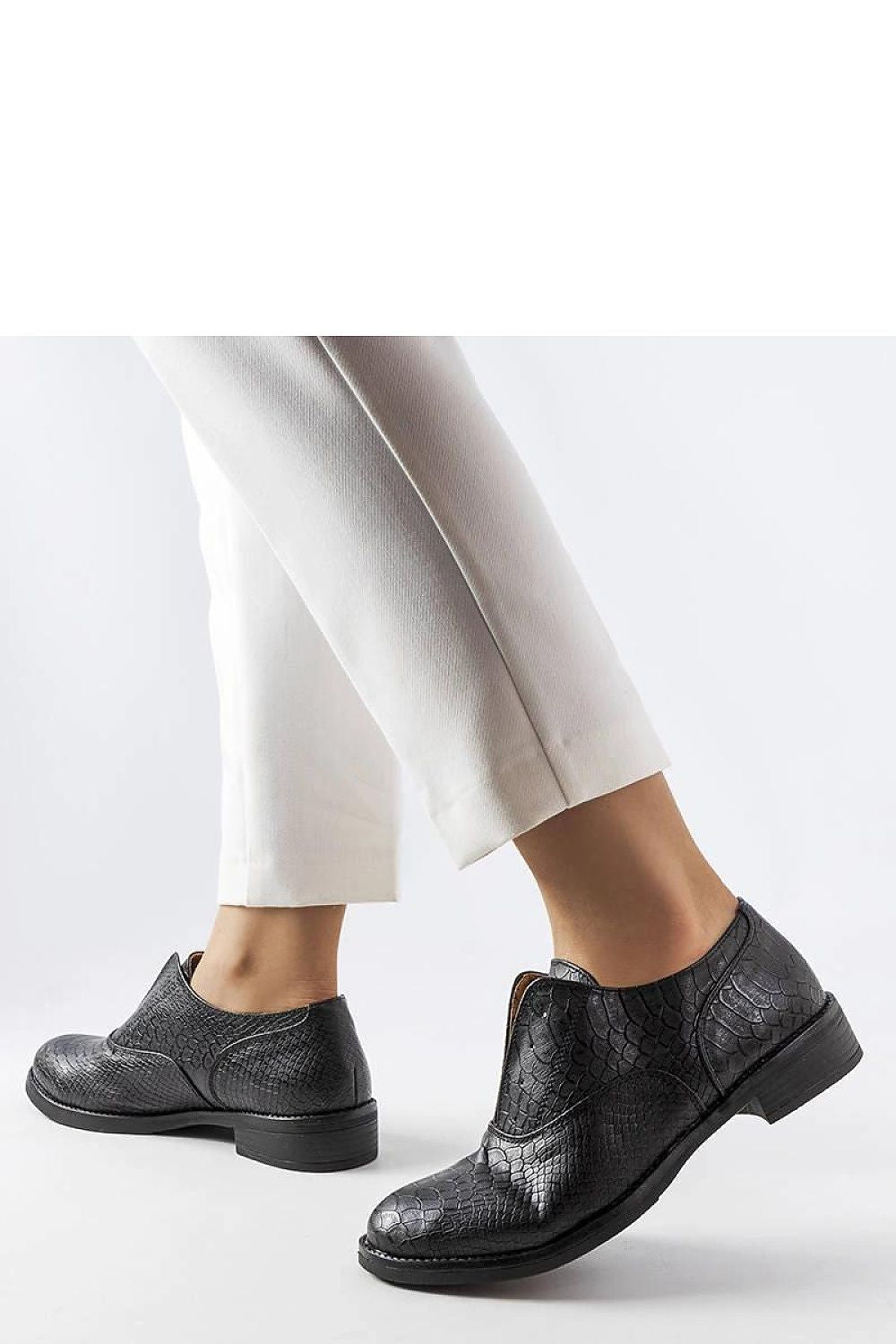 Close-up of Solea Eco-Leather Morel Women’s Slip-On Shoes highlighting the luxurious texture and practical slip-on closure.