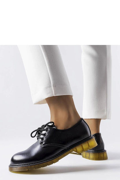 Solea Black Parfait style half shoes in eco leather, showcasing elegant round toes and stylish yellow rubber soles, perfect for a luxurious yet comfortable look.