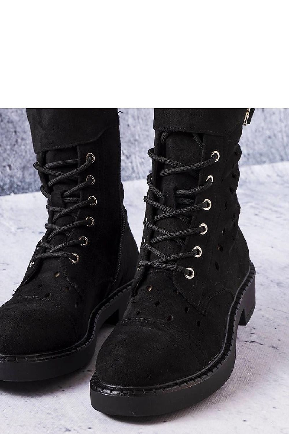 Luxury Solea black ankle boots with intricate openwork design, eco-friendly suede material, and practical rubber sole, ideal for boho-chic summer outfits.