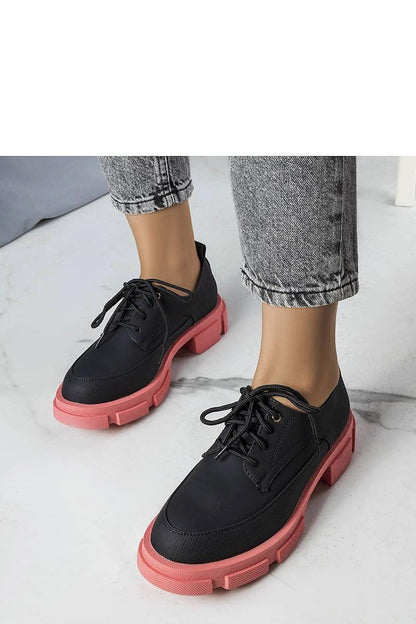 Comfortable and stylish Solea eco-leather half shoes, adorned with minimalist stitching and a round toe design.