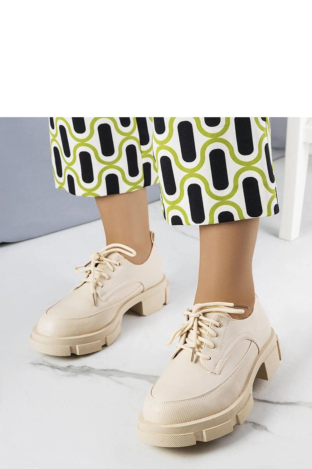 Detail close-up of Solea eco-leather half shoes, showcasing the elegant design and soft insole for ultimate comfort.