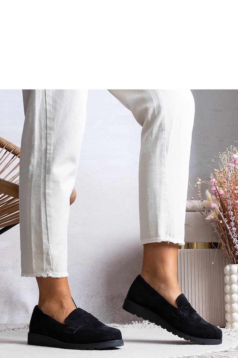 Solea elegant black Haydon loafers for women showcasing a stylish suede-like finish, designed for comfort and sophistication, perfect for summer days.