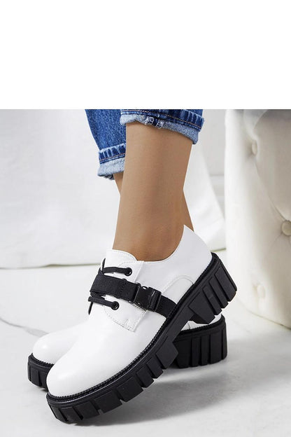 Elegant Solea white half shoes featuring a stylish tractor sole, crafted from natural leather for ultimate comfort.