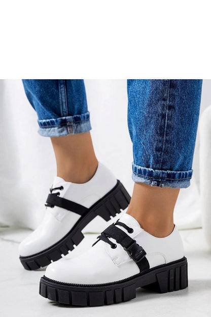 Solea white half shoes featuring a stylish tractor sole, crafted from natural leather, perfect for luxurious summer wear.