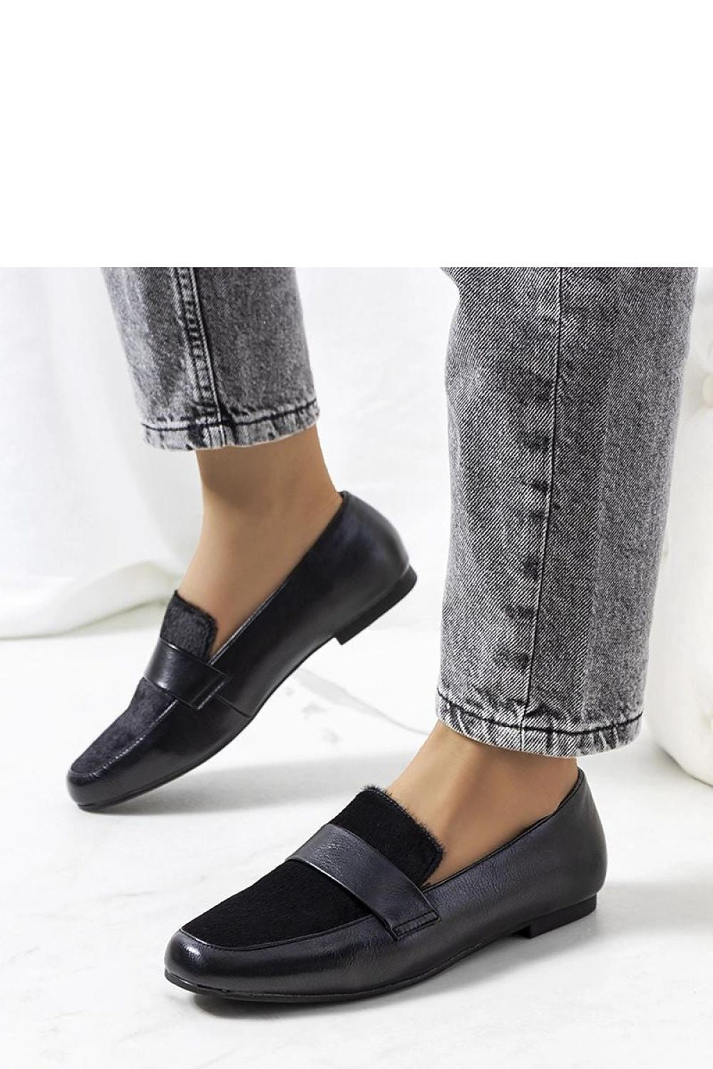 Luxurious Solea black women's slip-on loafers moccasins crafted from high-quality synthetic leather, providing superior comfort and stylish elegance for any summer outfit.