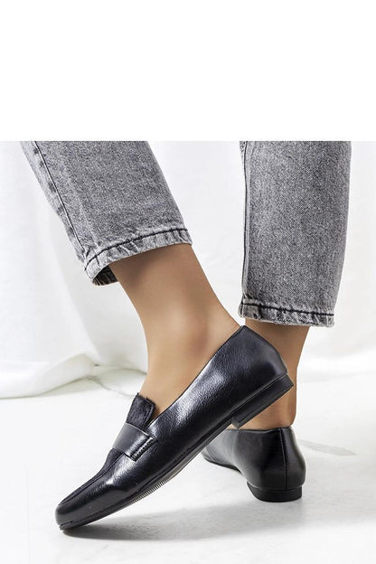 Solea black women's loafers featuring a sleek design with rubber sole for excellent grip and easy slip-on closure, ideal for sophisticated summer fashion.