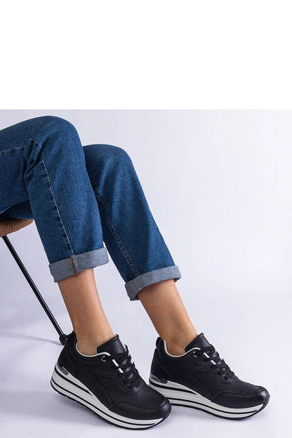 Close-up of Solea black platform sneakers Ursula showcasing intricate sequin embellishments and premium eco-leather material.