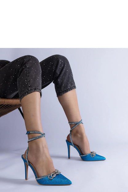 Elegant Solea pink glitter stilettos with eye-catching rhinestones, designed for fashionable women who love luxury footwear.