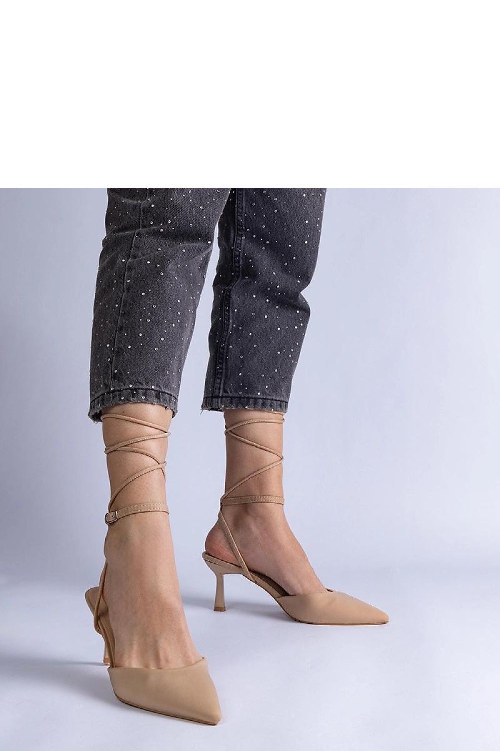 Elegantly designed Solea beige high heel pumps with open heel and ankle tie, perfect summer footwear for women, showcasing high quality leather and a chic look.