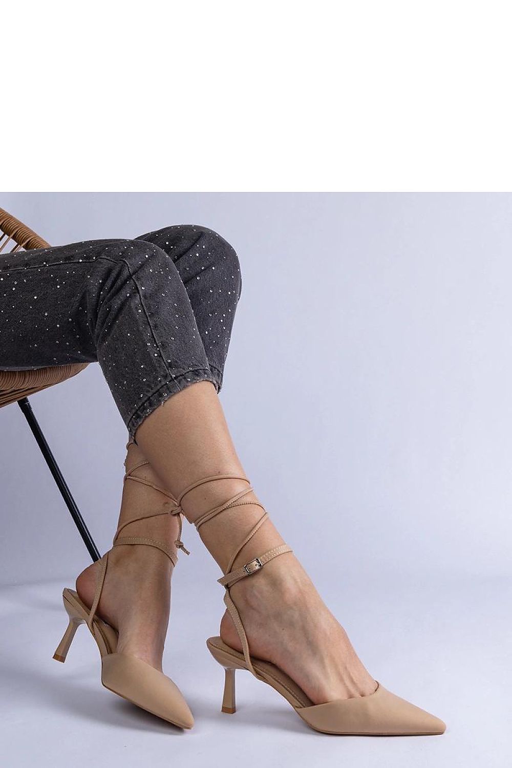 Elegant Solea beige high heel pumps with open heel and ankle tie, perfect summer footwear for chic styling.