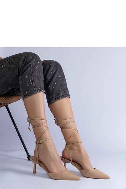 Luxury Solea high heel pumps in beige, featuring a comfortable fit and sophisticated design ideal for summer occasions.