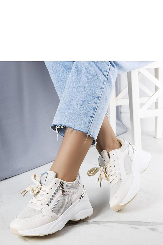 Solea beige wedge sneakers Stacey showcasing a stylish summer look, perfect for warm days, with a comfortable white rubber sole.