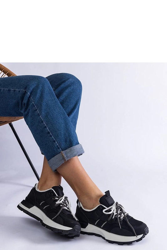 Stylish black women's sporty footwear from Solea, the Adalia Hurtado sneakers embody timeless elegance and versatility, suitable for casual and athletic wear.