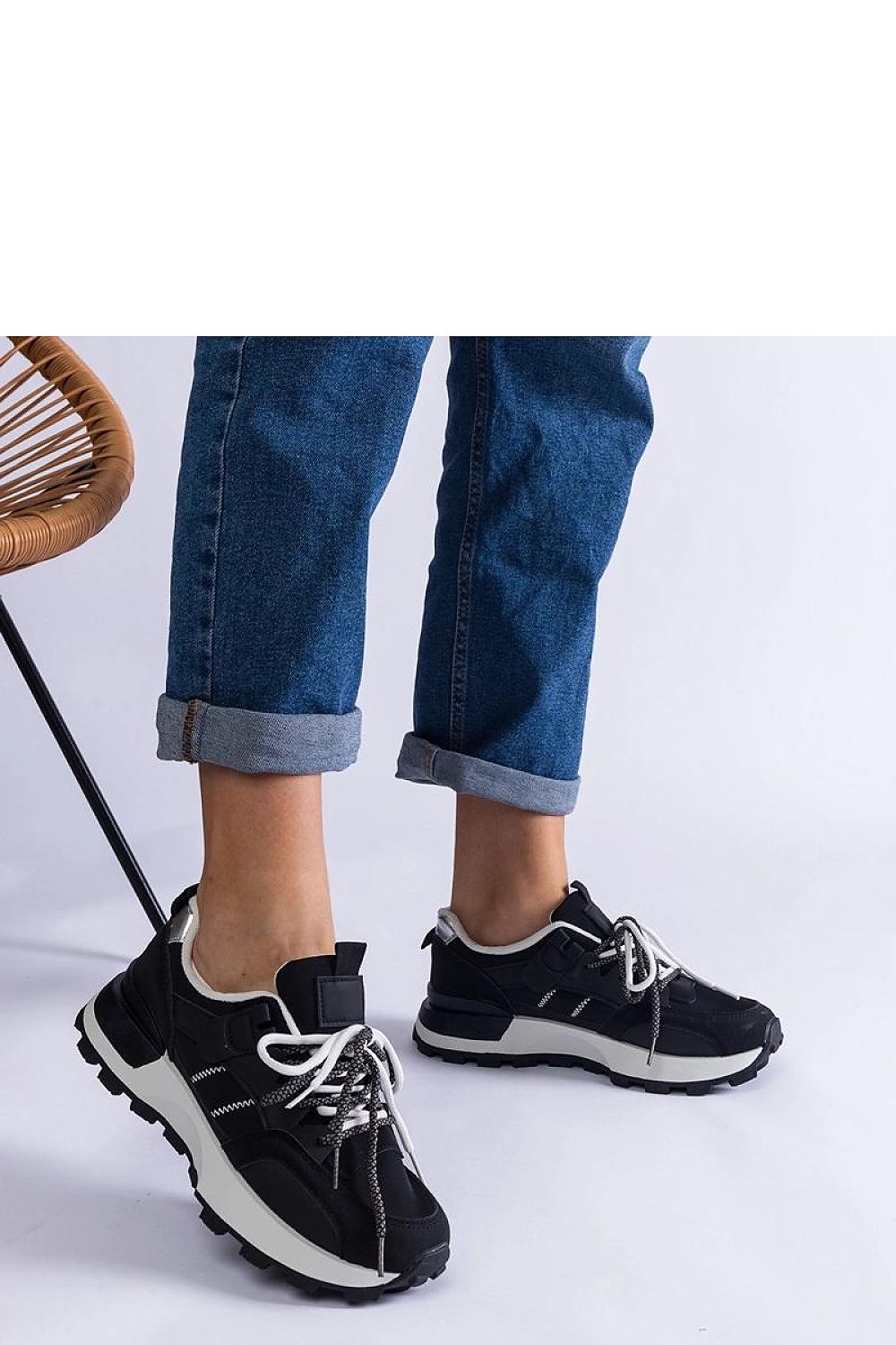 Chic black women's sports sneakers designed by Solea, the Adalia Hurtado pair offers sophistication and breathability for all-day wear.