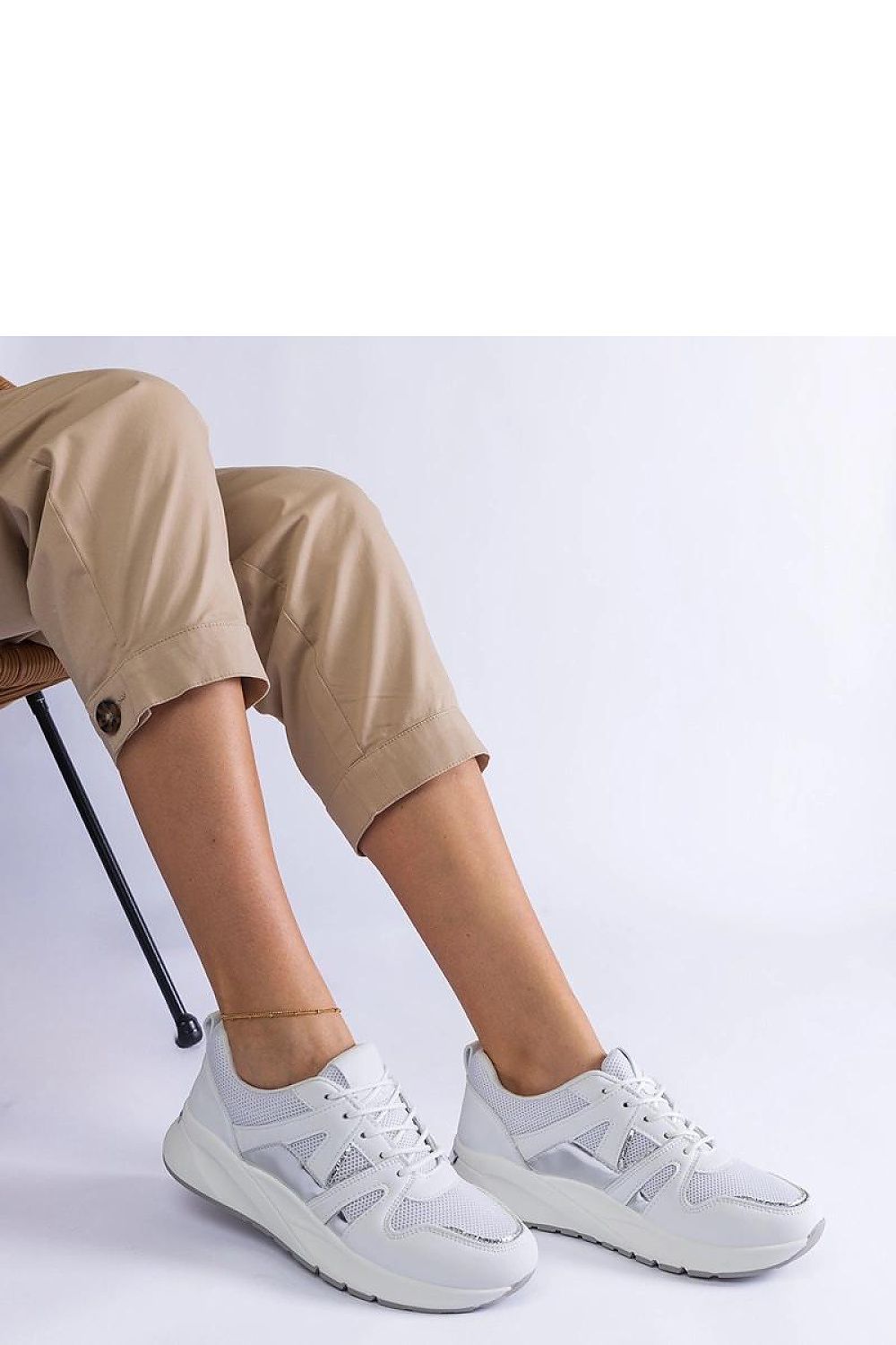 Solea White Eco-Leather Sierra Hurtado Sneakers featuring a stylish thick sole, elegantly designed for comfort. Ideal for both casual and formal attire, these trendy sneakers are available in sizes EU 36-41.