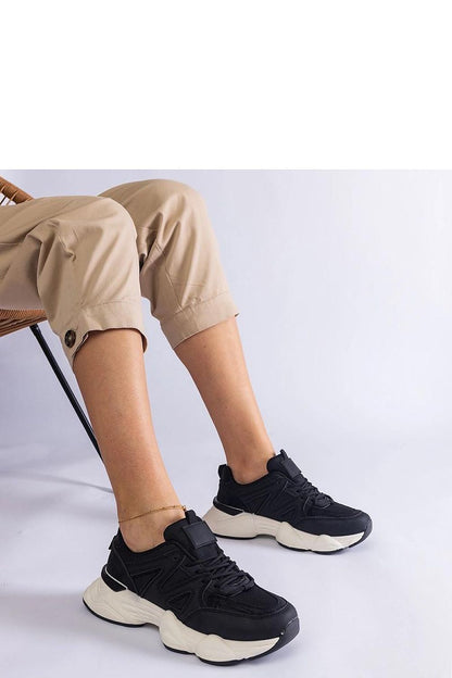 Solea women's black sports sneakers Imperio Hurtado showcasing a stylish design and rubber white sole, perfect for active and fashionable lifestyles.