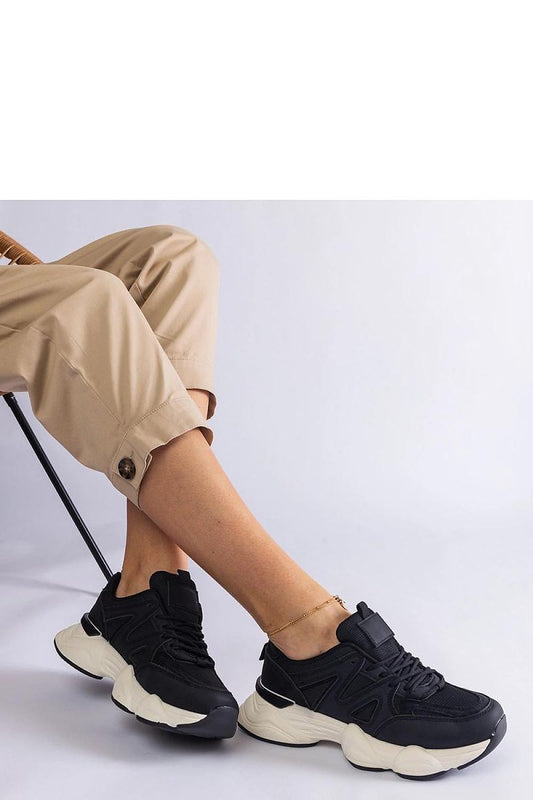 Comfortable Solea Imperio Hurtado black sports sneakers, highlighting the synthetic leather material and durable construction ideal for everyday wear.