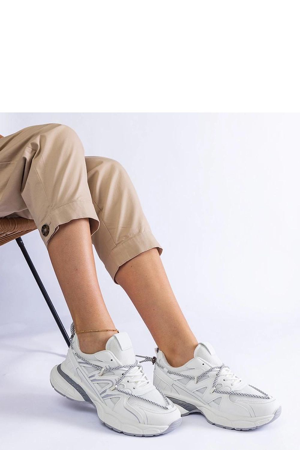 Elegant Colunga Hurtado silver women's sneakers with a comfortable large sole, showcasing a stylish design for modern fashion.